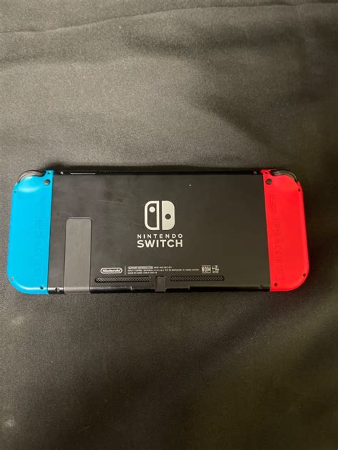 nintendo switch pre owned controller.